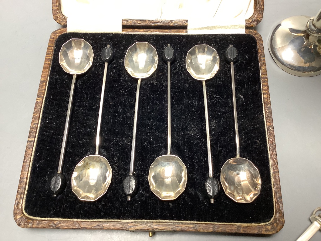 A silver cigarette case, coffee spoons, small bowl, vase and a small modern spoon by Guild of Handicrafts.